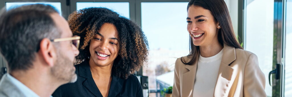 Professionals mingling at an event.